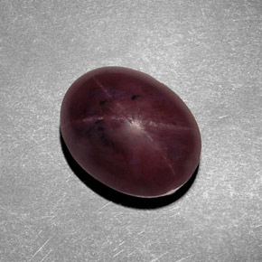 9.38克拉天然红色星光石榴石，椭圆形切割，12.1×9.5毫米，不透明