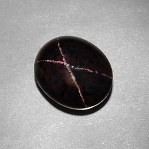 9.54克拉天然黑色星光石榴石，椭圆形切割，12.8×10.7毫米，不透明