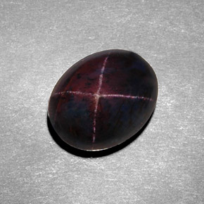 8.98克拉天然黑色星光石榴石，椭圆形切割，12.3×9.7毫米，不透明