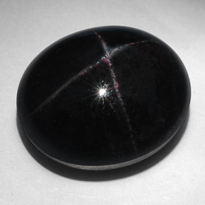 52.94克拉天然黑色星光石榴石，椭圆形切割，21.5×18.3毫米，不透明