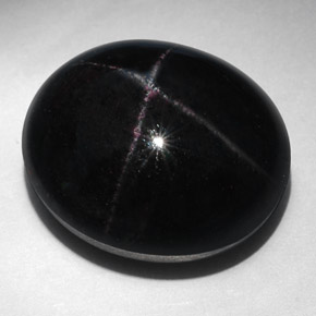 52.94克拉天然黑色星光石榴石，椭圆形切割，21.5×18.3毫米，不透明