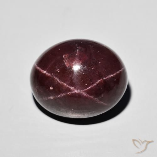 24.09ct 天然 桃花心木红 星石榴石, 椭圆形, 不透明