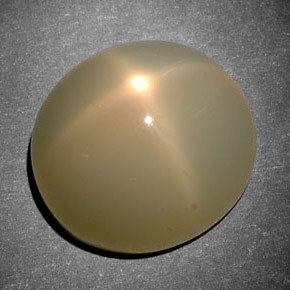 11.42克拉天然奶油色星光月光石，椭圆形切割，13.8×12.6毫米，半透明
