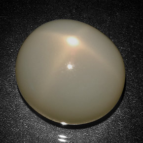 31.27克拉天然奶油色星光月光石，椭圆形切割，18.7×17毫米，半透明