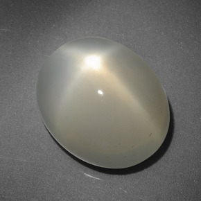 6.58克拉天然奶油色星光月光石，椭圆形切割，13×10.5毫米，半透明