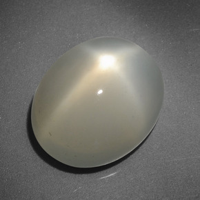 6.58克拉天然奶油色星光月光石，椭圆形切割，13×10.5毫米，半透明