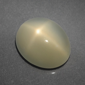 4.06克拉天然奶油色星光月光石，椭圆形切割，11.1×9毫米，半透明