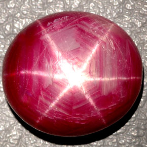 27.00克拉天然红色星光红宝石，椭圆形切割，17.8×16.1毫米，不透明