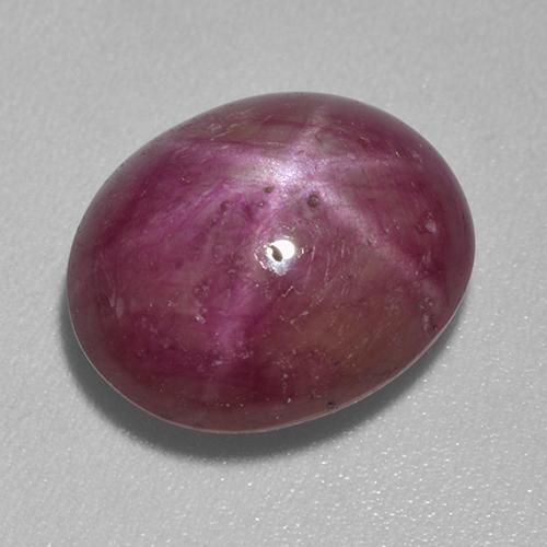7.03克拉天然紫色星光红宝石，椭圆形切割，12.6×10.5毫米，不透明