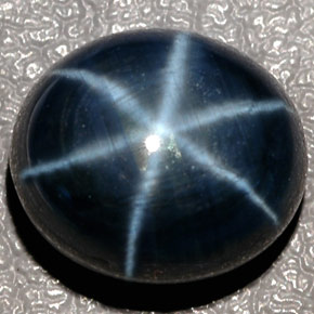 12.43克拉天然星光蓝宝石，椭圆形切割，12.8×11.1毫米，半透明