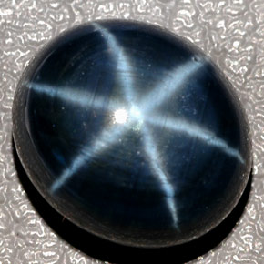 12.43克拉天然星光蓝宝石，椭圆形切割，12.8×11.1毫米，半透明
