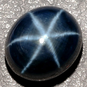 12.43克拉天然星光蓝宝石，椭圆形切割，12.8×11.1毫米，半透明