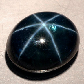 11.53克拉天然星光蓝宝石，椭圆形切割，12.6×10.2毫米，半透明