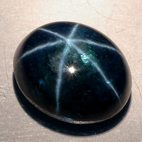 11.53克拉天然星光蓝宝石，椭圆形切割，12.6×10.2毫米，半透明