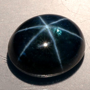 11.53克拉天然星光蓝宝石，椭圆形切割，12.6×10.2毫米，半透明