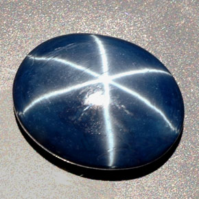 27.48克拉天然星光蓝宝石，椭圆形切割，19.4×15.4毫米，不透明