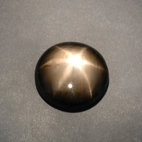 12.04克拉天然黑色星光蓝宝石，椭圆形切割，15.7×14.7毫米，不透明