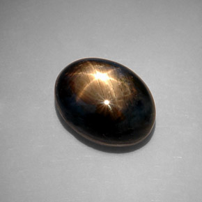 10.65克拉天然黑色星光蓝宝石，椭圆形切割，13.1×9.9毫米，不透明