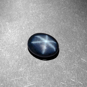1.44克拉天然星光蓝宝石，椭圆形切割，7.9×6毫米，不透明