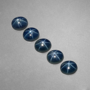 天然星光蓝宝石，椭圆形切割，5.2×4.2毫米，半透明