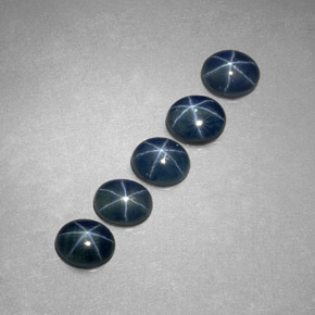 天然星光蓝宝石，椭圆形切割，5.2×4.3毫米，半透明
