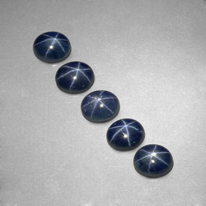天然星光蓝宝石，椭圆形切割，5.2×4.3毫米，半透明