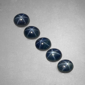 天然星光蓝宝石，椭圆形切割，5.2×4.3毫米，半透明