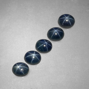 天然星光蓝宝石，椭圆形切割，5.2×4.3毫米，半透明