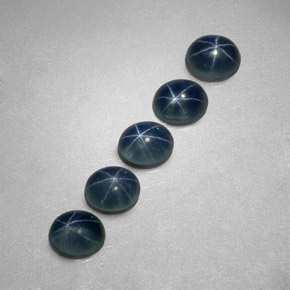 天然星光蓝宝石，椭圆形切割，5.3×4.2毫米，半透明