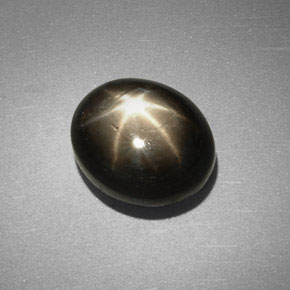 6.38克拉天然黑色星光蓝宝石，椭圆形切割，10.6×8.9毫米，不透明