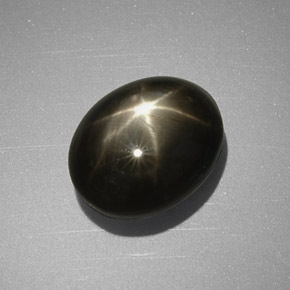 5.63克拉天然黑色星光蓝宝石，椭圆形切割，10.4×8.5毫米，不透明