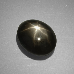 5.63克拉天然黑色星光蓝宝石，椭圆形切割，10.4×8.5毫米，不透明