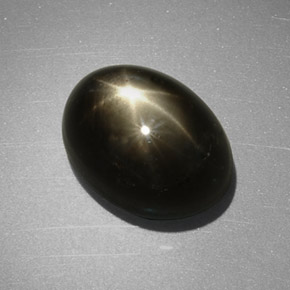 7.55克拉天然黑色星光蓝宝石，椭圆形切割，11.6×8.6毫米，不透明