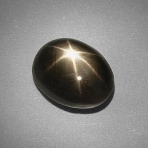 5.66克拉天然黑色星光蓝宝石，椭圆形切割，10.9×8.3毫米，不透明