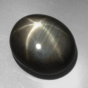 27.29克拉天然黑色星光蓝宝石，椭圆形切割，19.4×16.5毫米，不透明