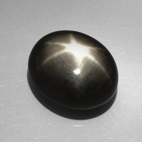 27.17克拉天然黑色星光蓝宝石，椭圆形切割，17.9×14.7毫米，不透明