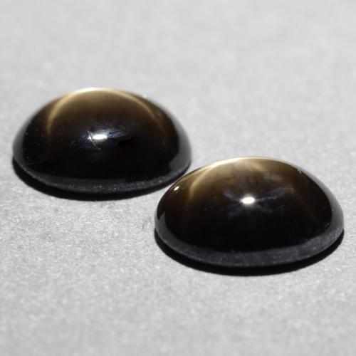 1.81天然黑色星光蓝宝石，椭圆形切割，6.8×5毫米，不透明