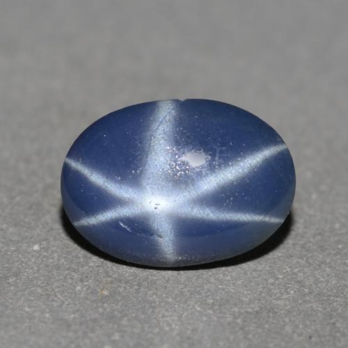 0.72克拉天然星光蓝宝石，椭圆形切割，6.8×4.9毫米，半透明