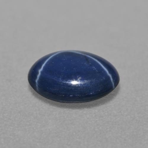 0.84克拉天然星光蓝宝石，椭圆形切割，6.8×5毫米，半透明