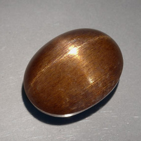 23.68克拉天然棕色星光日光石，椭圆形切割，18.8×14.3毫米，不透明