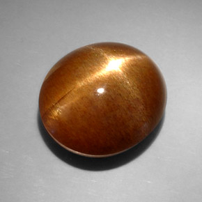 14.95克拉天然棕色星光日光石，椭圆形切割，15.9×14.3毫米，不透明