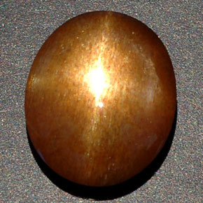 8.09克拉天然棕色星光日光石，椭圆形切割，16×13.2毫米，不透明