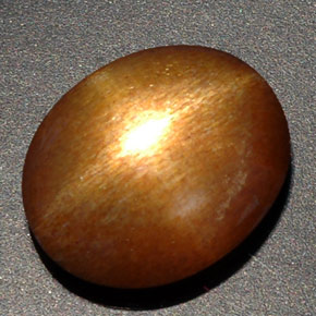 8.09克拉天然棕色星光日光石，椭圆形切割，16×13.2毫米，不透明