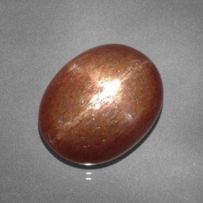 15.61克拉天然棕色星光日光石，椭圆形切割，18.1×14.5毫米，不透明
