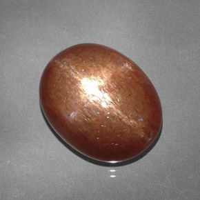 15.61克拉天然棕色星光日光石，椭圆形切割，18.1×14.5毫米，不透明