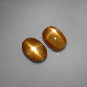天然棕色星光日光石，椭圆形切割，8.5×6毫米，不透明