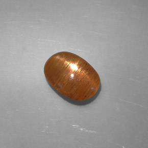 1.48克拉天然棕色星光日光石，椭圆形切割，9.4×6.7毫米，不透明