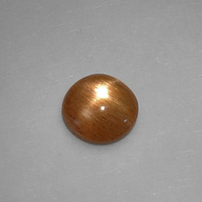 0.84克拉天然棕色星光日光石，透明，7.2×6.9毫米，透明/半透明