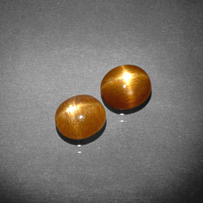 天然棕色星光日光石，椭圆形切割，6.5×5.9毫米，不透明