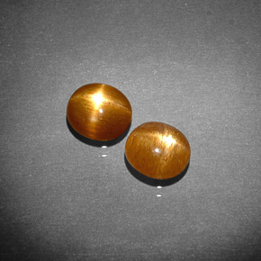 天然棕色星光日光石，椭圆形切割，6.5×5.9毫米，不透明